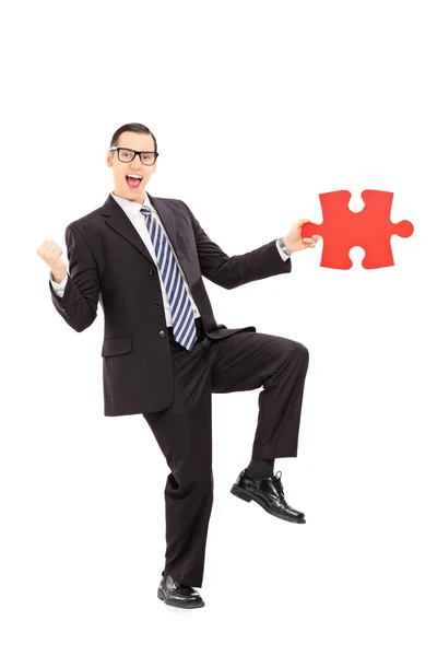 Businessman found the missing puzzle — Stock Photo, Image