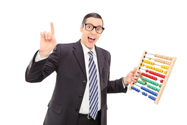 Excited businessman holding an abacus — Stock Photo, Image