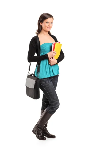 Female student holding notebooks — Stock Photo, Image