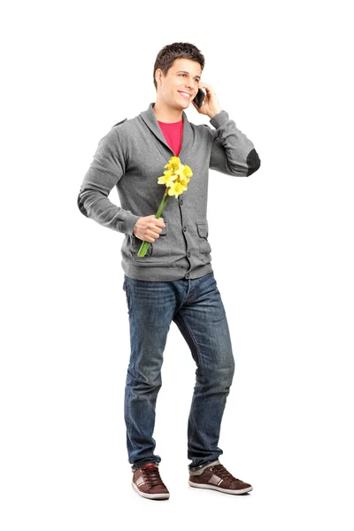 Homme tenant des fleurs — Photo