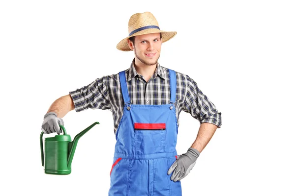 Gardener holding a watering can — Stock Photo, Image