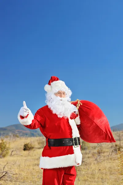 Babbo Natale con sacchetto di regali — Foto Stock