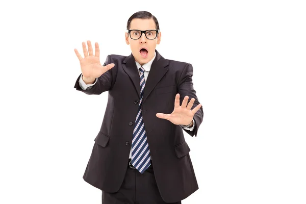 Shocked businessman gesturing rejection — Stock Photo, Image