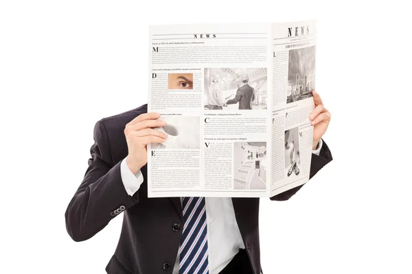Босс подглядывает в дыру в газете — стоковое фото
