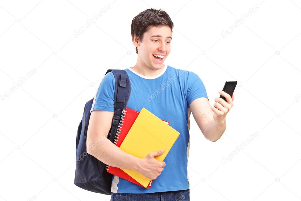 Student looking in his cell phone