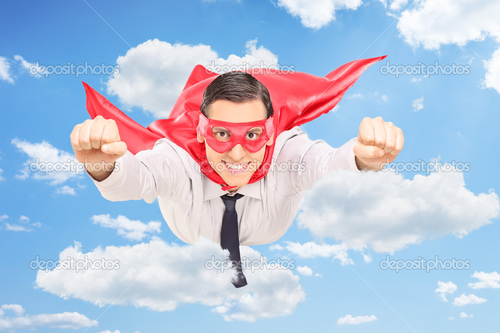 Superhero flying through the clouds