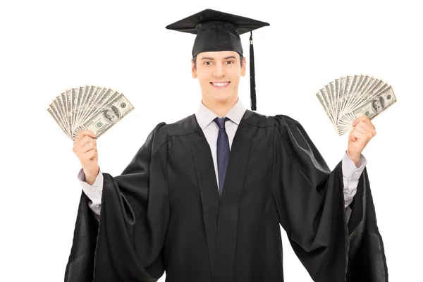 Hombre estudiante de posgrado sosteniendo dinero — Foto de Stock