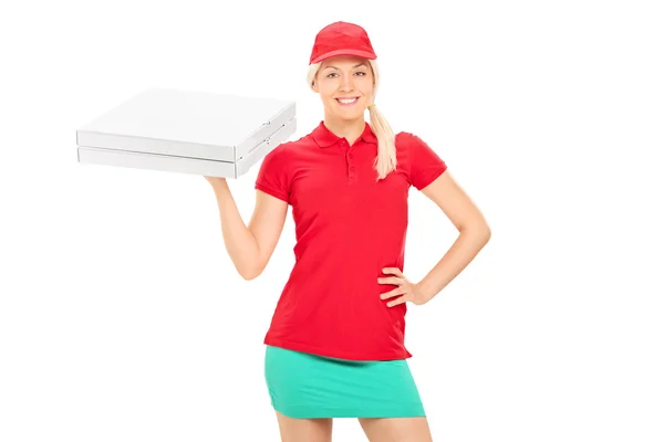 Delivery girl holding pizza — Stock Photo, Image