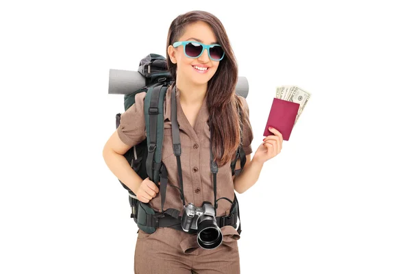 Female tourist holding passport — Stock Photo, Image