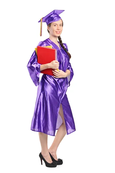 Woman in graduation gown — Stock Photo, Image