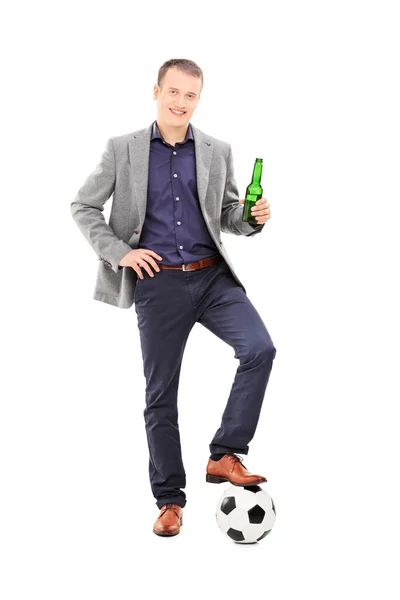Football fan holding beer — Stock Photo, Image