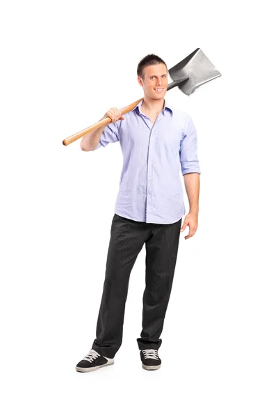 Young man holding shovel — Stock Photo, Image