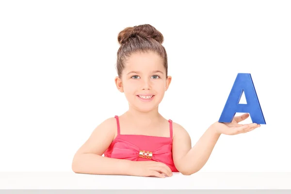 Girl holding letter a — Stock Photo, Image