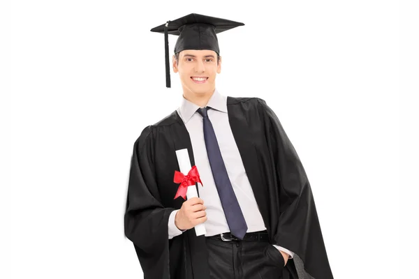 Male graduate holding diploma — Stock Photo, Image