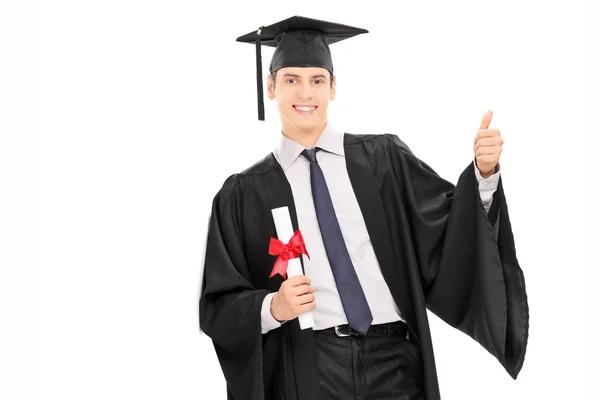Male graduate holding diploma — Stock Photo, Image