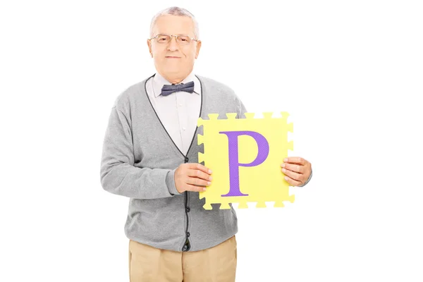 Man holding piece of puzzle — Stock Photo, Image