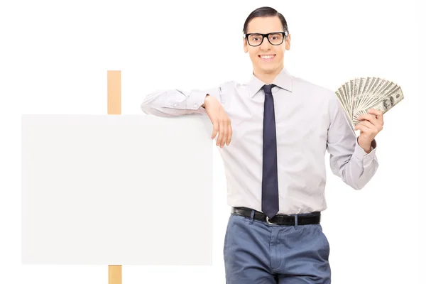 Man holding money — Stock Photo, Image