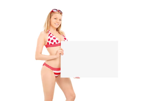 Attractive woman holding blank banner — Stock Photo, Image