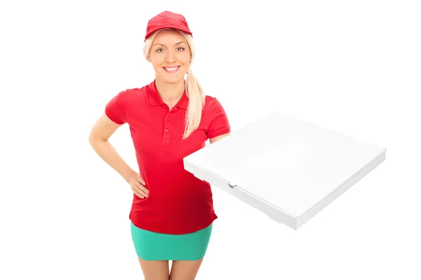 Delivery girl holding pizza — Stock Photo, Image