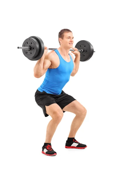 Man lifting heavy weight — Stock Photo, Image