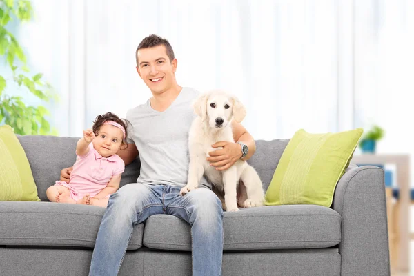 Father with daughter and puppy — Stock Photo, Image