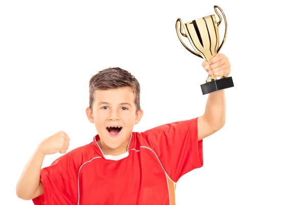 Szczęśliwa chłopca gospodarstwa Złoty Puchar — Zdjęcie stockowe