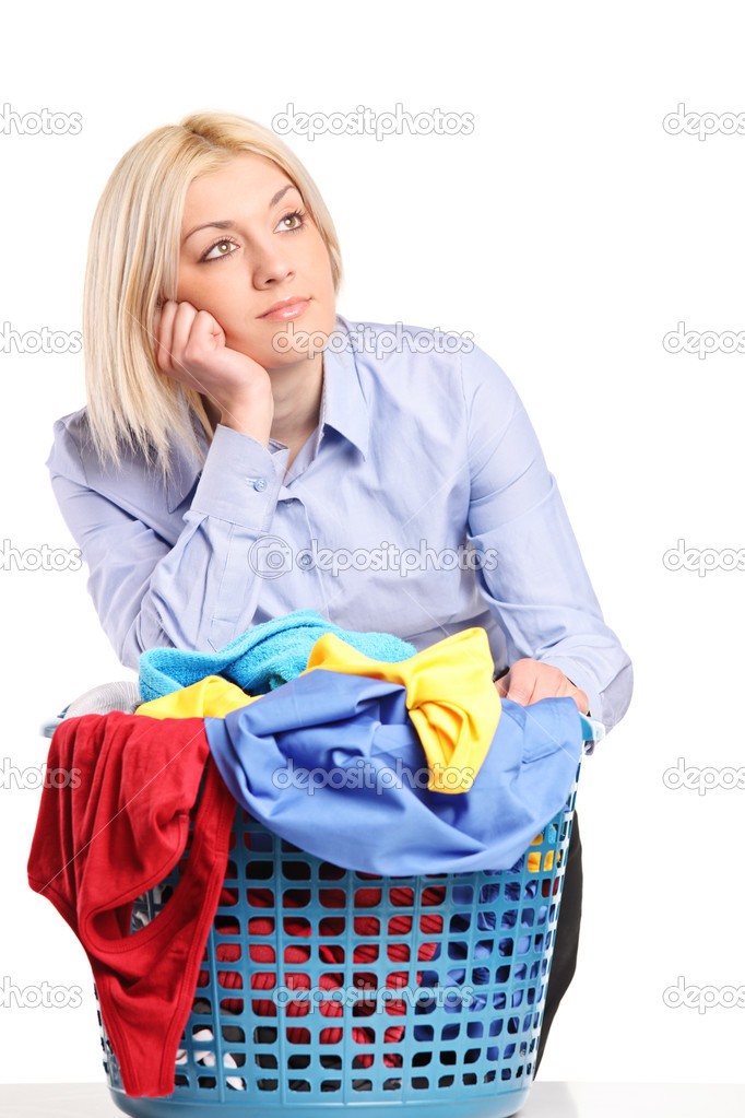 Woman leaning on laundry basket