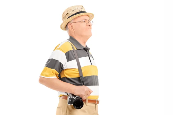 Mature tourist with camera — Stock Photo, Image