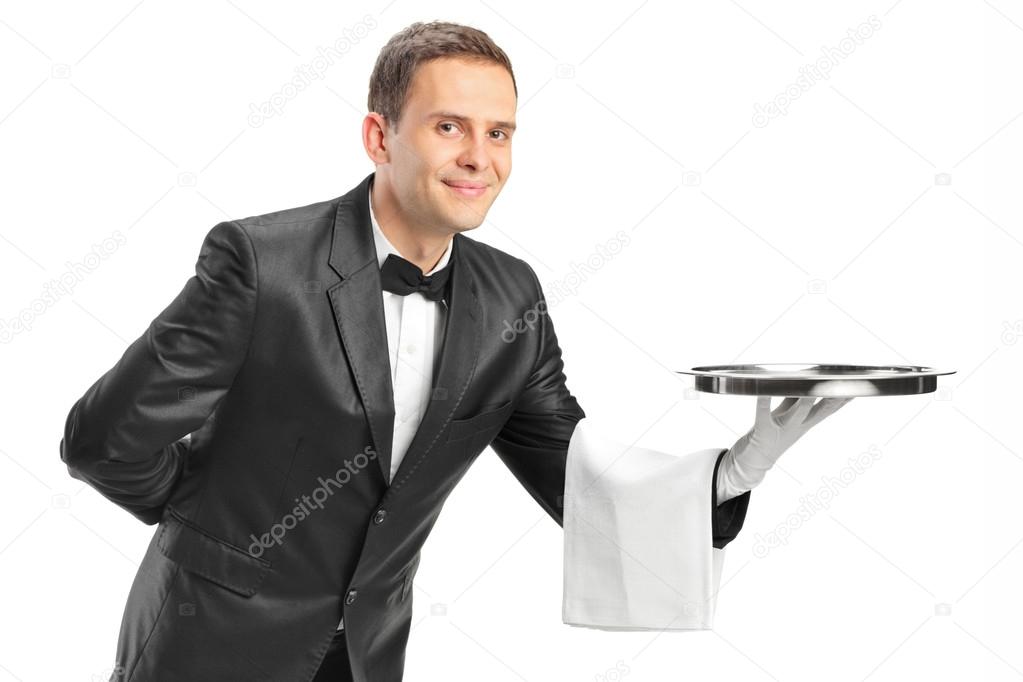 Professional waiter holding tray