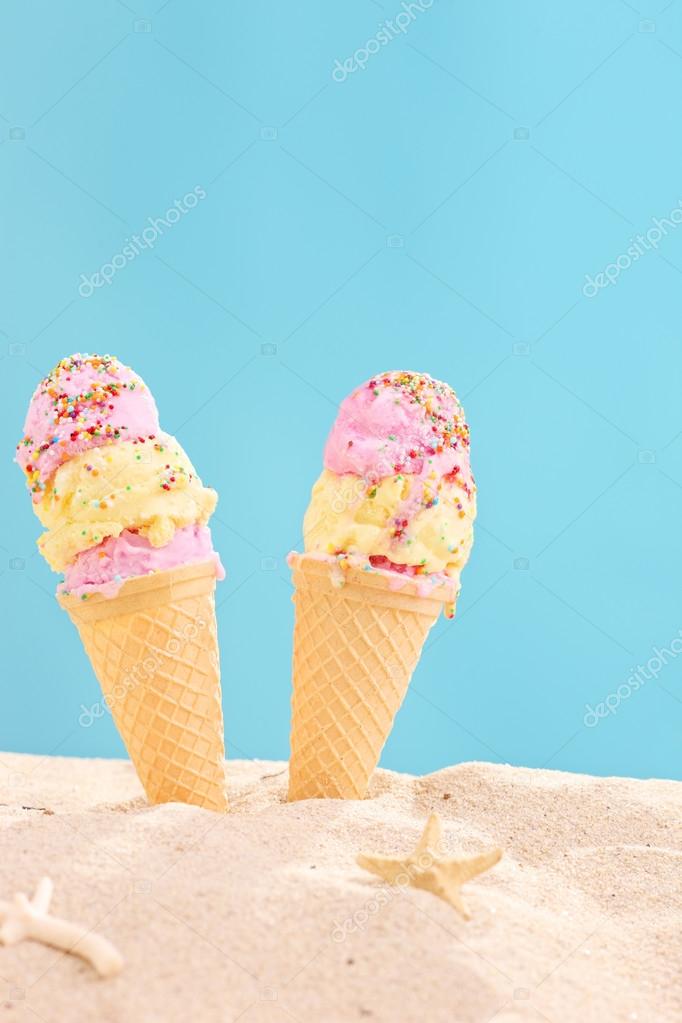 Ice creams stuck in sand Stock Photo by ©ljsphotography 48917757