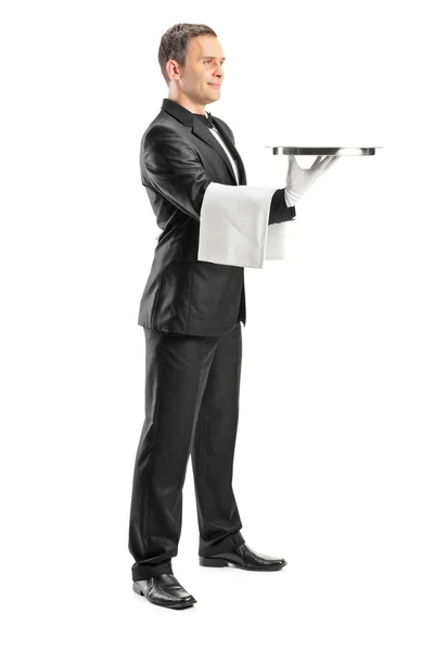 Male waiter holding tray — Stock Photo, Image