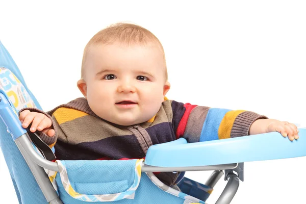 Babyjongen in voeding stoel — Stockfoto