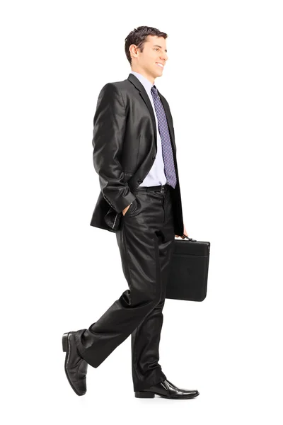 Business man holding briefcase — Stock Photo, Image