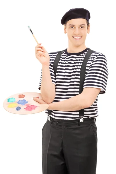 Male artist with paintbrush — Stock Photo, Image