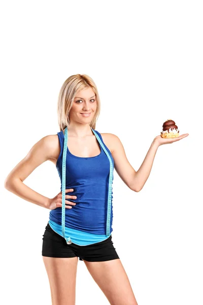 Beautiful woman holding cake — Stock Photo, Image