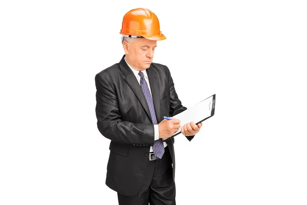 Trabajador de la construcción tomando notas — Foto de Stock