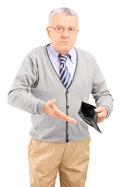 Senior gentleman holding empty wallet — Stock Photo, Image