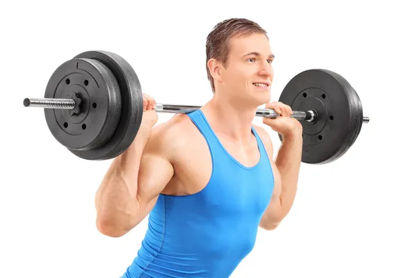 Man lifting heavy weight — Stock Photo, Image