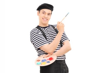 erkek ressam holding boya fırçası