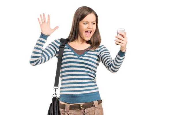 Girl looking at cell phone — Stock Photo, Image