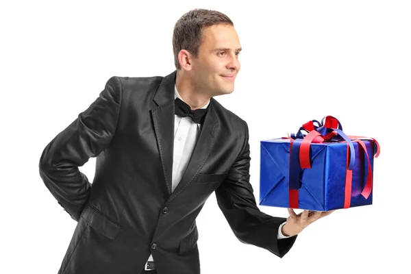 Guy giving present to someone — Stock Photo, Image