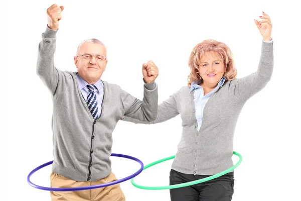 Man and woman with hula hoop — Stock Photo, Image