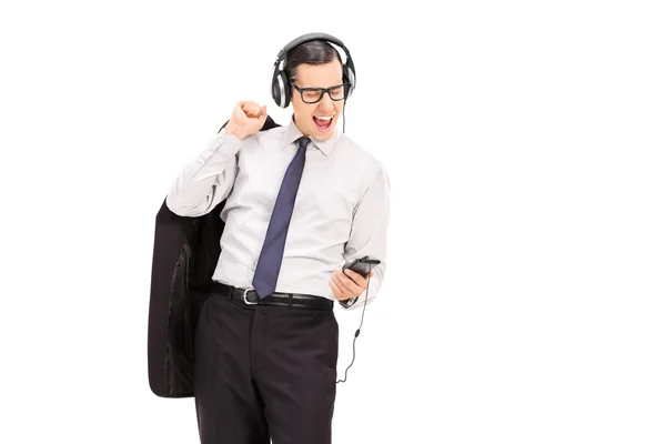 Biznesmen słuchający muzyki — Zdjęcie stockowe