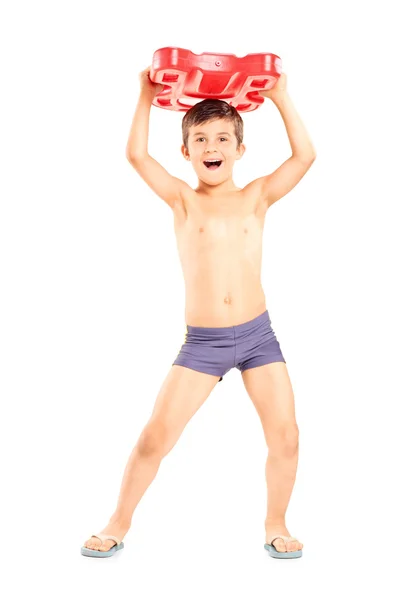 Overjoyed boy holding swimming float — Stock Photo, Image