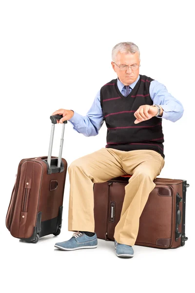 Senior tourist checking time — Stock Photo, Image