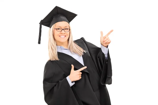 Female graduate student pointing — Stock Photo, Image
