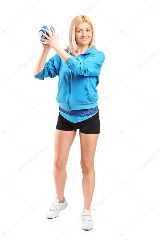 Female handball player holding ball