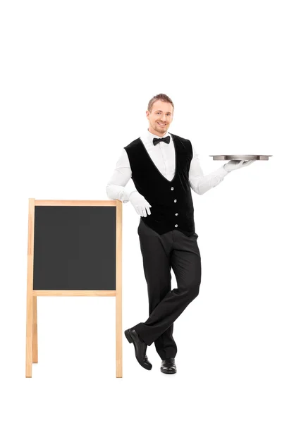 Male waiter holding tray — Stock Photo, Image