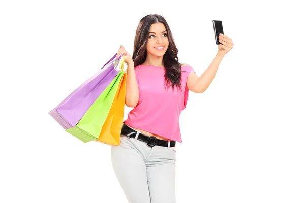 Chica sosteniendo bolsas de compras — Foto de Stock