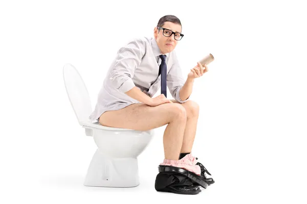 Man holding used toilet paper — Stock Photo, Image